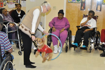 Little Bear performs at Orchard Rehabilitation and Healthcare with his master Shannon Stabler Linden, formerly of Greenville. 