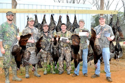 Taking honors in the first Lowndes County Turkey Rodeo hosted at Harrell and Sons Farm in Hayneville this past Saturday are from left, third place winners Todd Bradford and Taylor Stoudenmire, both of Selma; first place winners Dewayne Reeves of Ashville, N.C. and Sandy Harrell of Hayneville; and second place Trav Foster and Patten Thompson, both of Fort Deposit. Foster and Thompson also took Best Double honors. 
