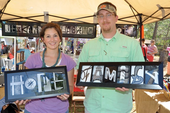 Colleen and Jared Kelley of Marbury show off letter photography in which one takes photos of objects resembling letters used to spell names.