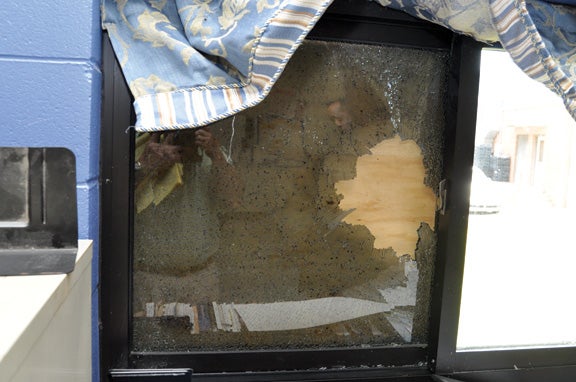 Thieves entered the building by breaking a window.