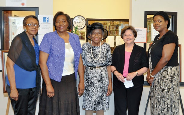 With Jimmie Robinson Felder, center, are from left are Hayneville-Lowndes Library Board of Trustees members Jimmie Timmons; Carolyn Dubose, vice chairman; Patricia Farrior, chairman; and Rhonda Daniel. Not pictured is Mary Yelder, secretary.