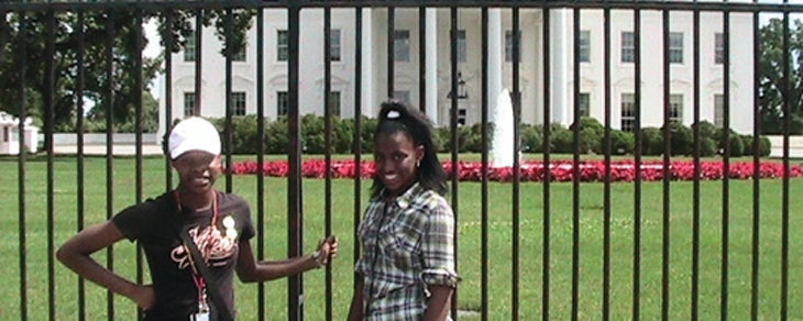 Orianna Gordon, left, and Trinity Hardy, right, stand in front of the White House during their recent trip. 