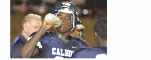 A Calhoun Tiger takes a deserved water break during Friday night's slugfest with Goshen, who won 26-22 in Letohatchee.