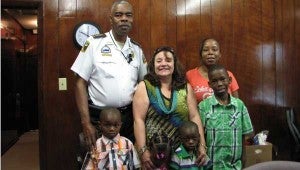 Sheriff John Williams stopped by to show his support during a Kids and Kin workshop at the Family Service Center of Lowndes County in July 2014. First Row: Raydrick McDonald, Fort Deposit Head Start student, Gabrielle Carter, Future Central Head Start student and Jaquan Wright, Central Head Start student. Second row: Debbie Bloodworth-Child Care Partner and Jer’rell Fort-Central Elementary School. Third row: Sheriff John Williams and future parent Janiese Carter.