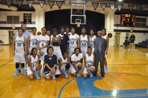 The Calhoun Lady Tigers claimed their second straight area title Friday night by defeating arch rival and area runner-up the Central Lady Lions.