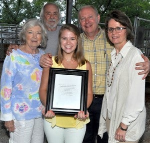 Scholarship winner Keri Ward, a graduate of Lowndes Academy shows off her $1,000 Lowndes County Cattlewomen’s Association Scholarship with her grandparents at left, Joe and Laura Ward, and her mother and father at right, Joey and Lora Ward. Fred Guarino/Lowndes Signal. 