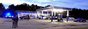 Law enforcement on the scene of a robbery/shooting at the Marathon gas station on U.S. 80 in Lowndes County.